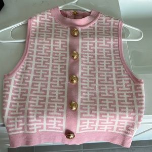 Pink and white top with gold buttons